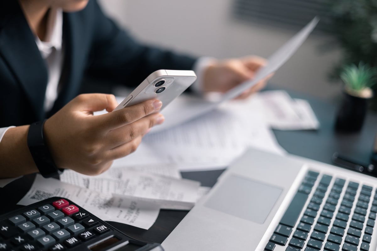 Financial professional analyzing documents